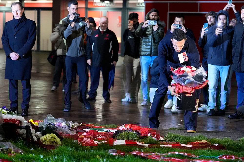 Real Madrids Trent Alexander-Arnold lays a tribute at the Diogo Jota memorial