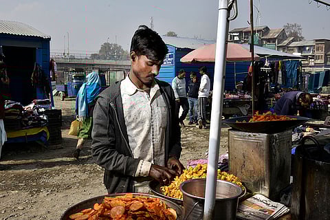 Md. Rehmat (21) from Hasanpur, Bihar runs his snack stall for over 12 years in Chadura area of central Kashmir