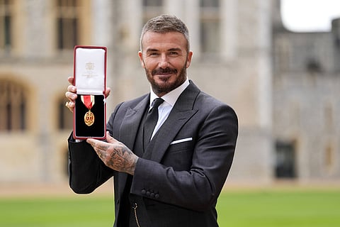 Sir David Beckham after he was made a Knight Bachelor at an investiture ceremony at Windsor Castle, Berkshire, England.