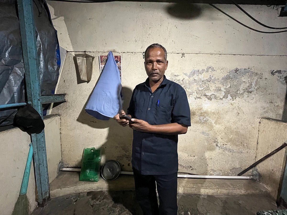 Photo - Priyanka Tupe.   : Gangaprasad Singh, migrant from Bihar's Darbhanga works as a security guard, live in this 70 sq feet cabin. Deepak Darbhangias maithili bhajans help him survive alianation from ballot battle on melancholic nights. 