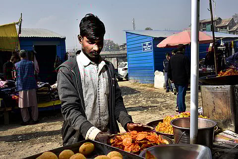 Md. Rehmat (21) from Hasanpur, Bihar runs his snack stall for over 12 years in Chadura area of central Kashmir
