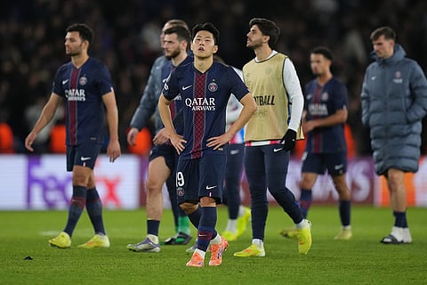 PSG's Kang-in Lee reacts after the Champions League opening phase soccer match between Paris Saint-Germain and Bayern Munich in Paris, France.