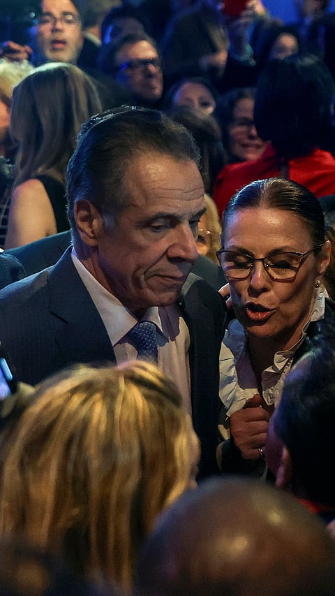 Andrew Cuomo talks with supporters in New York. 