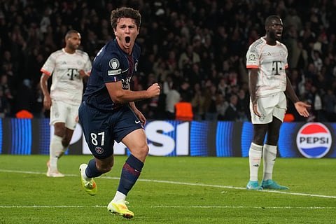PSG's Joao Neves celebrates after scoring his side's opening goal during the Champions League opening phase soccer match between Paris Saint-Germain and Bayern Munich in Paris, France.