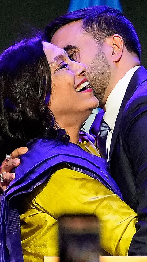 Zohran Mamdani greets his mother Mira Nair