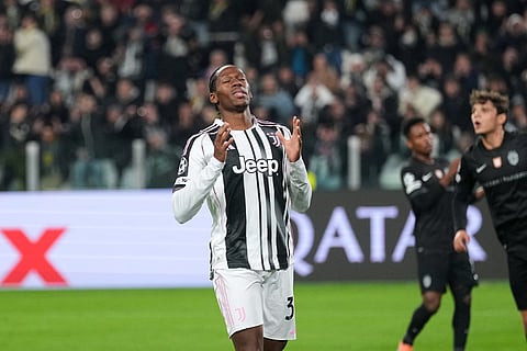 Juventus' Jonathan David reacts after a missed chance to score during the Champions League opening phase soccer match between Juventus and Sporting CP in Turin, Italy.