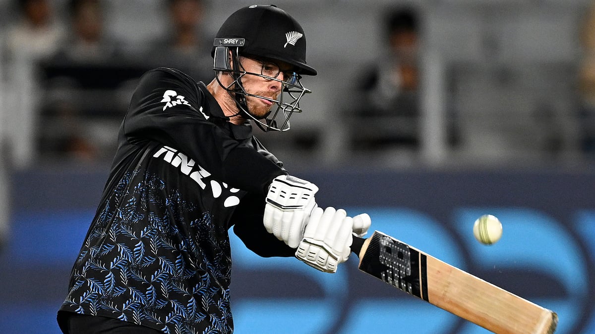 Andrew Cornaga/Photosport via AP : New Zealand's Mitchell Santner bats during the T20 cricket international between New Zealand and the West Indies in Auckland, New Zealand, Wednesday, Nov. 5, 2025