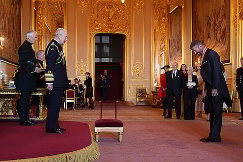 Sir David Beckham is made a Knight Bachelor by Britain's King Charles III during an Investiture ceremony at Windsor Castle, Berkshire, England.