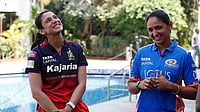 WPL 2026: Harmanpreet, Mandhana, Rodrigues Among Stars Retained - Report BCCI : File photo of RCB skipper Smriti Mandhana (L) with Mumbai Indians captain Harmanpreet Kaur.