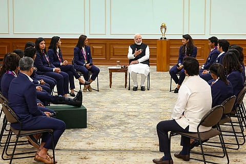 Prime Minister Narendra Modi meets the Indian Women's World Cup-winning team at his residence, in New Delhi.