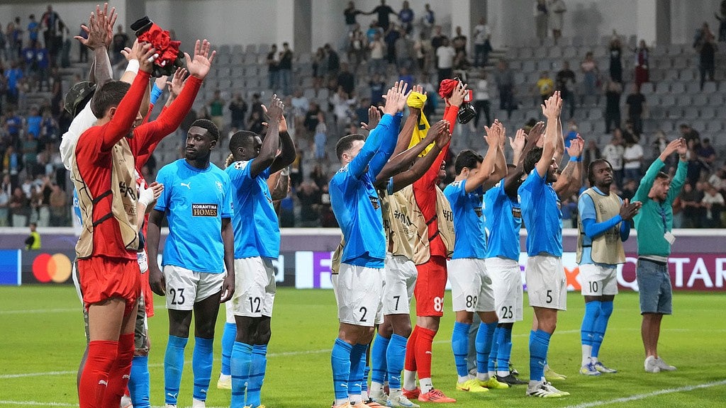 Pafos players celebrate after winning the UEFA Champions League match against Villarreal in Limassol, Cyprus. - AP