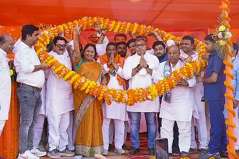 In this image, Delhi Chief Minister Rekha Gupta joins NDA candidate for the Sherghati Assembly constituency Uday Kumar Singh during a public meeting, in Sherghati, Gaya district, Bihar.