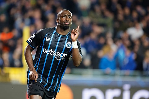 Brugge's Carlos Forbs celebrates after scoring his sides third goal during the Champions League opening phase soccer match between Club Brugge and Barcelona in Bruges, Belgium.