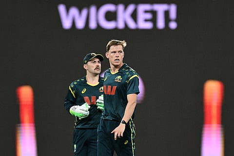 Australian bowler Nathan Ellis reacts after dismissing Indian batsman Shubman Gill during a T20 cricket international between India and Australia in Carrara, Australia.