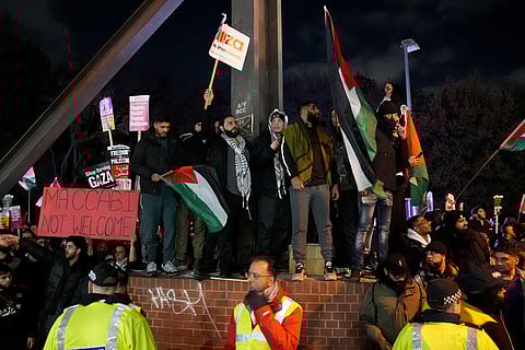 Pro Palestinian campaigners protest outside Villa Park, ahead of the Europa League soccer match between Aston Villa and Maccabi Tel Aviv in Birmingham, England.