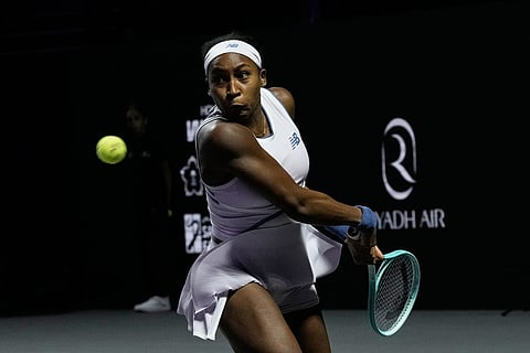 Coco Gauff of the United States plays a backhand return to Aryna Sabalenka of Belarus during their women's singles match at the WTA tennis finals in Riyadh, Saudi Arabia.