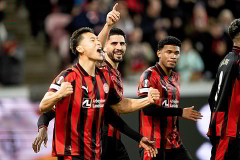 Midtjylland's players celebrate after Martin Erlic scored their side's first goal of the game during the Europa League soccer match between FC Midtjylland and Celtic FC in Herning, Denmark.