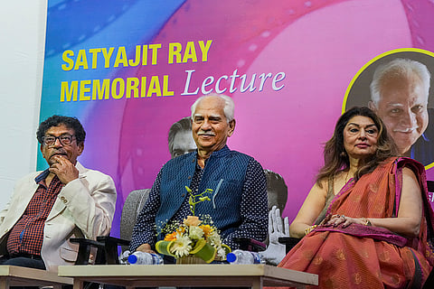 From left, film director and actor Goutam Ghose, veteran director and Padma Shri recipient Ramesh Sippy and his wife and actor Kiran Juneja during the Satyajit Ray Memorial Lecture at the 31st Kolkata International Film Festival (KIFF), in Kolkata.