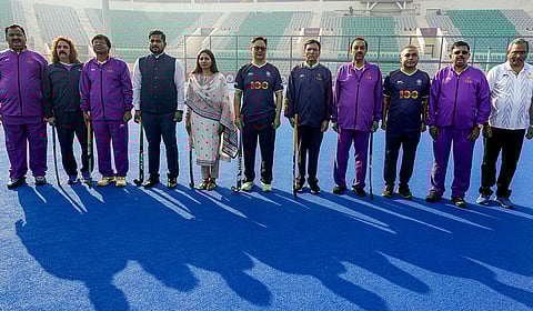 New Delhi: Union Sports and Youth Affairs Minister Mansukh Mandaviya, Union Minister Kiren Rijiju, Hockey India President Dilip Tirkey and others during an event marking 100 years of Indian Hockey, at Major Dhyan Chand National Stadium, in New Delhi.