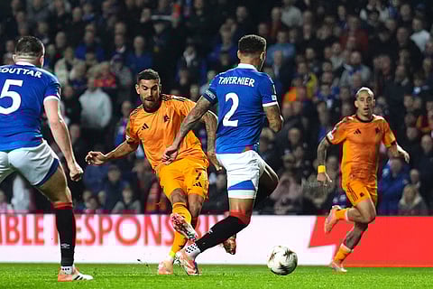 Roma's Lorenzo Pellegrini scores during the Europa League soccer match between Rangers and Roma in Glasgow, Scotland.