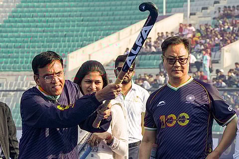 Union Minister for Sports Mansukh Mandaviya with Union Minister Kiren Rijiju during the Hockey India centenary celebrations, at Major Dhyan Chand National Stadium, in New Delhi.