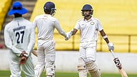 Photo: PTI : Vidarbha's Ravikumar Samarth being congratulated on his half century on the fourth and last day of the Ranji Trophy 2025-26 cricket match between Vidarbha and Jharkhand, in Nagpur, Maharashtra