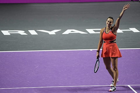 Aryna Sabalenka of Belarus celebrates after her win against Coco Gauff of the United States in the women's singles match at the WTA tennis finals in Riyadh, Saudi Arabia.