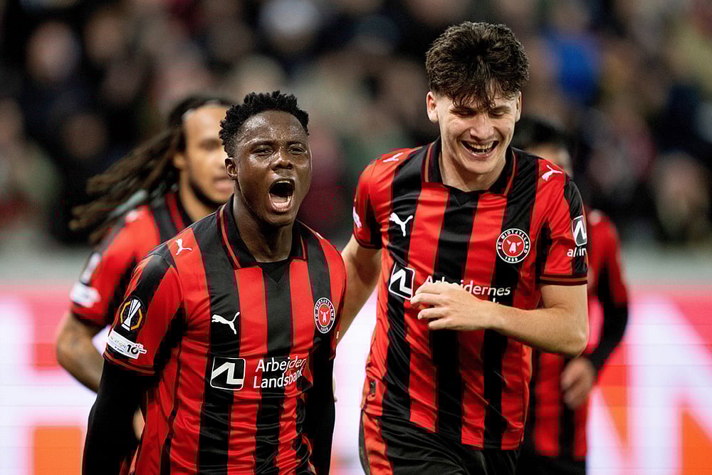 Midtjylland's Franculino Dju, left, together with Mikel Gogorza celebrate scoring their side's third goal of the game during the Europa League soccer match between FC Midtjylland and Celtic FC in Herning, Denmark. - | Photo: Bo Amstrup/Ritzau Scanpix via AP