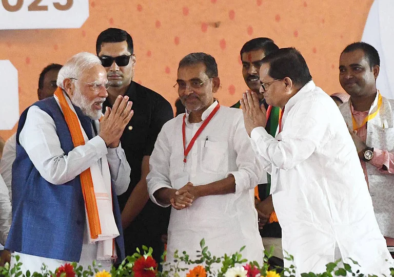 Prime Minister Narendra Modi with Rashtriya Lok Morcha president Upendra Kushwaha and chairman of Bihar Legislative Council Awadhesh Narayan Singh during a public rally in support of NDA candidates ahead of Bihar Assembly Elections 2025 on November 2, 2025 in Ara, India. Modi’s roadshow drew an overwhelming response from women, many of whom described the Prime Minister as a leader who transformed their lives through welfare schemes and social empowerment initiatives. - IMAGO - Hindustan Times