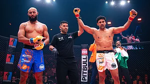 Special Arrangement : Sangram Singh (right) exults after winning against Tunisia’s Hakim Trabelsi (right) in the Levels Fight League (LFL) in Europe.