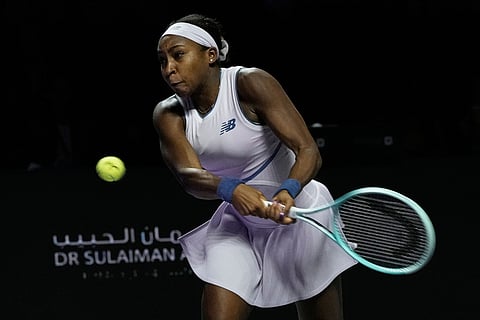 Coco Gauff of the United States plays a backhand return to Aryna Sabalenka of Belarus during their women's singles match at the WTA tennis finals in Riyadh, Saudi Arabia.