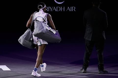 Coco Gauff of the United States leaves after her loss against Aryna Sabalenka of Belarus in the women's singles match at the WTA tennis finals in Riyadh, Saudi Arabia.