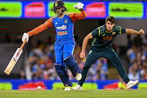 India's Abhishek Sharma completes a run during the fifth T20I cricket match of a series between India and Australia, in Brisbane, Australia.