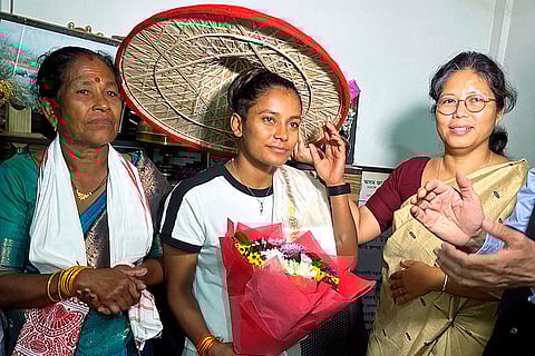 Uma Chetry, member of the Women's ODI World Cup 2025-winning Indian cricket team, being felicitated by Assam Sports Minister Nandita Gorlosa during a ceremony, in Golaghat district, Assam.