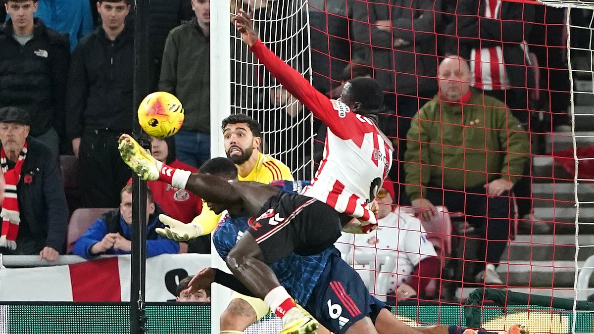(Owen Humphreys/PA via AP) : Sunderland's Brian Brobbey scores their side's second goal of the game against Arsenal during the Premier League match, Saturday, Nov. 8, 2025, in, Sunderland, England.