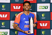 India Vs Australia: 5th T20I Called Off Due To Heavy Brisbane Rain; Tourists Clinch Series 2-1 | Photo: PTI/Izhar Khan : India's captain Suryakumar Yadav poses with the series trophy at the end of the five match T20I cricket series between India and Australia, in Brisbane, Australia. The fifth match got abandoned due to rain and India won the series 2-1.