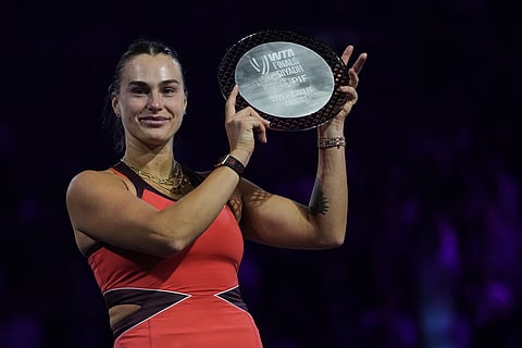 Aryna Sabalenka of Belarus holds her runner up trophy after losing to Elena Rybakina of Kazakhstan in the women's final singles match of the WTA finals in Riyadh, Saudi Arabia.