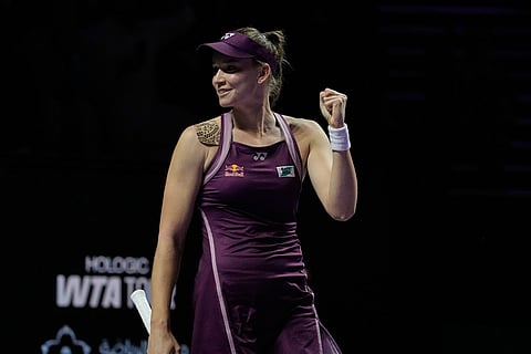 Elena Rybakina of Kazakhstan celebrates after defeating Aryna Sabalenka of Belarus in the women's final singles match of the WTA finals in Riyadh, Saudi Arabia.
