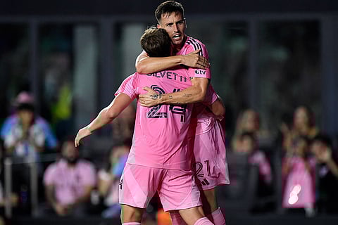 Inter Miami forward Tadeo Allende (21) celebrates with forward Mateo Silvetti (24) after a goal during the second half of Game 3 in the first round of MLS soccer's Western Conference playoffs against Nashville SC in Fort Lauderdale, Florida.