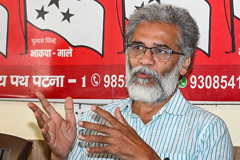 CPI (ML) General Secretary Dipankar Bhattacharya addresses a press conference, in Patna. - | Photo: PTI