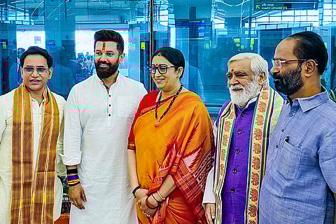 Union Minister and Lok Janshakti Party (Ram Vilas) leader Chirag Paswan with BJP leaders Smriti Irani and Dinesh Lal Yadav on the eve of the second phase of voting in the Bihar Assembly elections, in Patna.