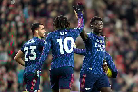 Arsenal's Bukayo Saka (right) celebrates scoring their side's first goal during the English Premier League soccer match between Arsenal and Sunderland, in Sunderland, England.