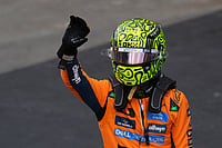 | Photo: AP/Andre Penner : McLaren driver Lando Norris of Britain celebrates finishing first during the qualifying session ahead of the Brazilian Formula One Grand Prix at the Interlagos race track, in Sao Paulo.
