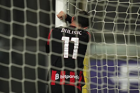 AC Milan's Christian Pulisic reacts after missing a scoring chance during the Serie A soccer match between Parma and AC Milan in Parma, Italy. 
