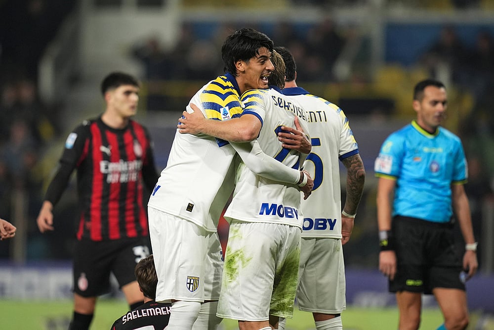 Parma's Mariano Troilo and Parma's Oliver Sorensen Jensen celebrate during the Serie A soccer match against Milan in Parma, Italy. - | Photo: Massimo Paolone/LaPresse via AP