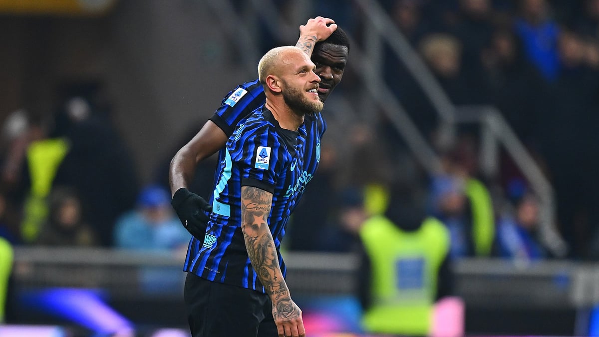 Inter Milan's Federico Dimarco celebrates with Ange-Yoan Bonny after his side's second goal against Lazio in Serie A on November 9, 2025. - null