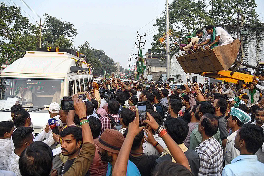 | Photo: PTI : RJD chief Lalu Prasad Yadav holds a roadshow in Danapur for party candidate Ritlal Yadav. The first phase of voting in the Bihar Elections is scheduled for November 6