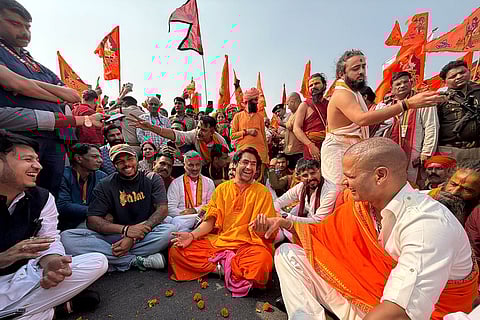 In this image posted, spiritual leader Dhirendra Shastri with cricketer Umesh Yadav and former cricketer Shikhar Dhawan during his 'Sanatan Hindu Ekta Padyatra'.