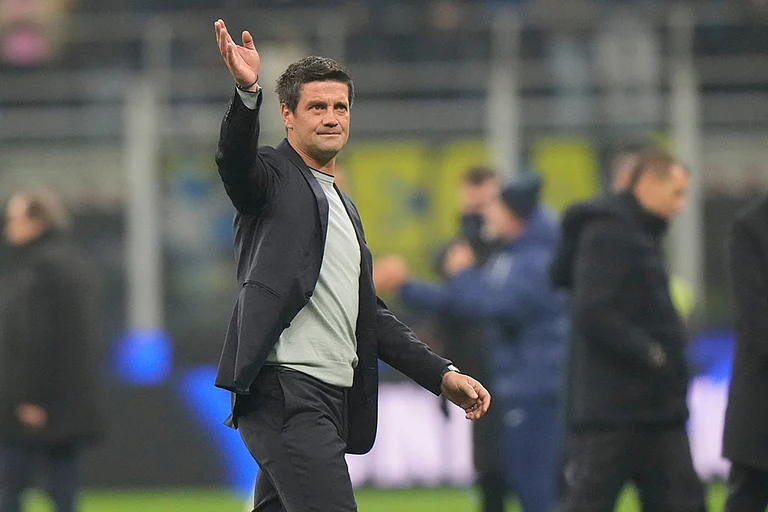 Inter Milan's head coach Cristian Chivu celebrates at the end of a Serie A soccer match between Inter Milan and Lazio, in Milan, Italy. - | Photo: AP/Luca Bruno