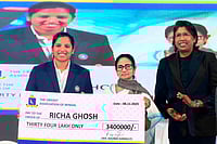 Richa Ghosh Honoured: Mamata Banerjee Affirms To Name New Darjeeling Stadium After Women's World Cup Winner | Photo: @AITCofficial/X via PTI : In this image posted, West Bengal Chief Minister Mamata Banerjee felicitates Richa Ghosh, member of the Women's ODI World Cup 2025-winning Indian cricket team, during a felicitation ceremony at Eden Gardens, in Kolkata. Former cricketer Jhulan Goswami is also seen.